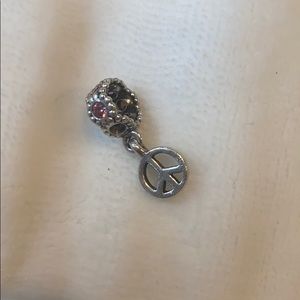 Pink pandora peace charm
